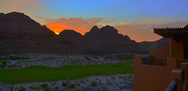 Sunrise over a desert golf course